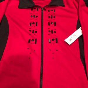 AC -ology shirt with black Gems on front